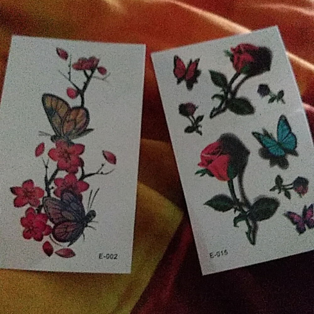 butterfly and rose tattoos
